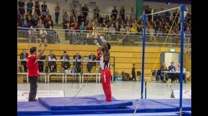 German Olympic champ pays visit to Cuban gymnastics star