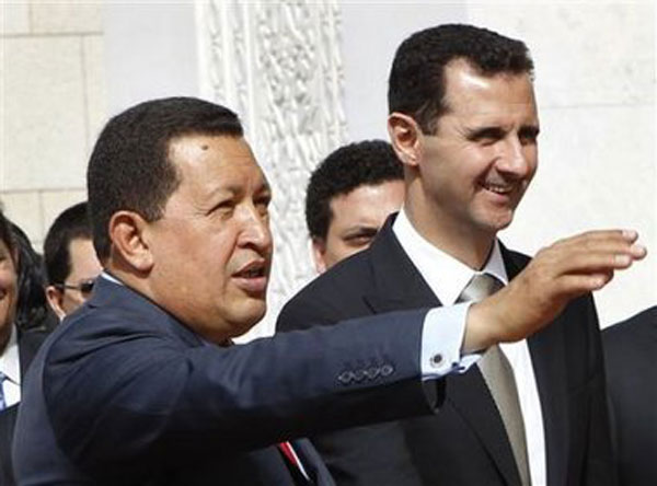El presidente venezolano, Hugo Chávez, y su homólogo sirio, Bashar al-Assad