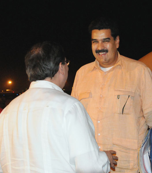 Bruno Rodríguez Parrilla y Nicolás Maduro