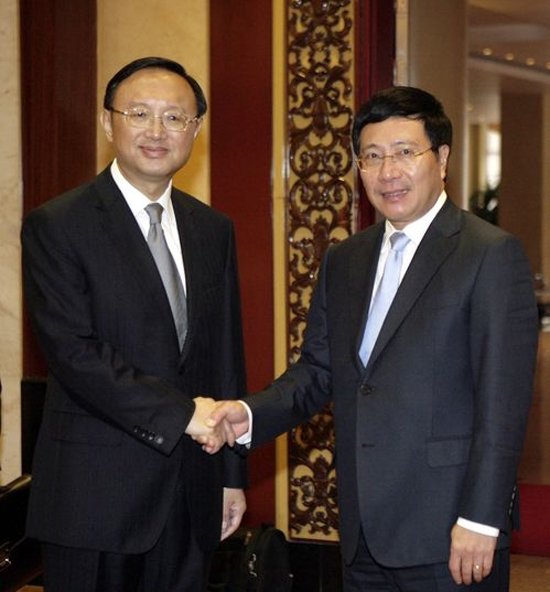 Yang Jiechi y Pham Bin Minh 