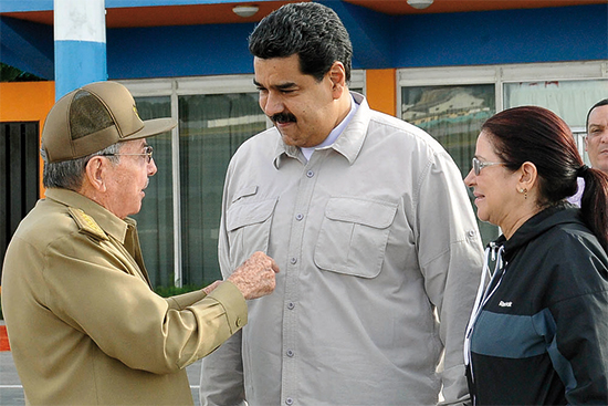 Raúl y Maduro