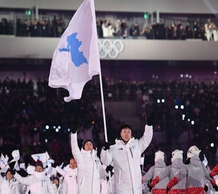 Las dos Coreas desfilan bajo una sola bandera