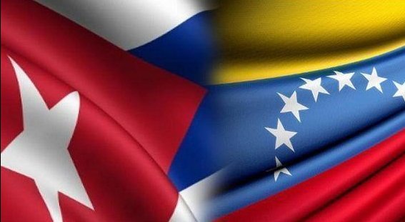 Banderas cubana y venezolana ondean unidas.