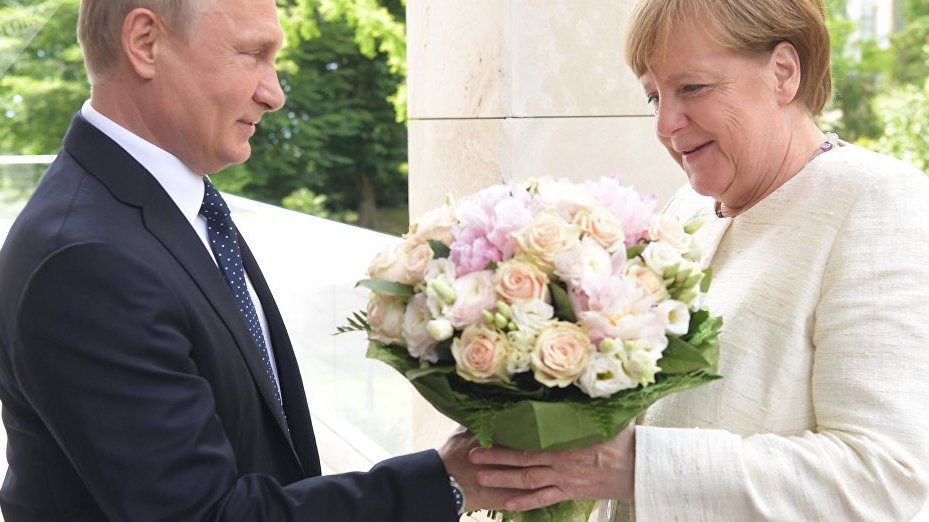 Putin y Merkel