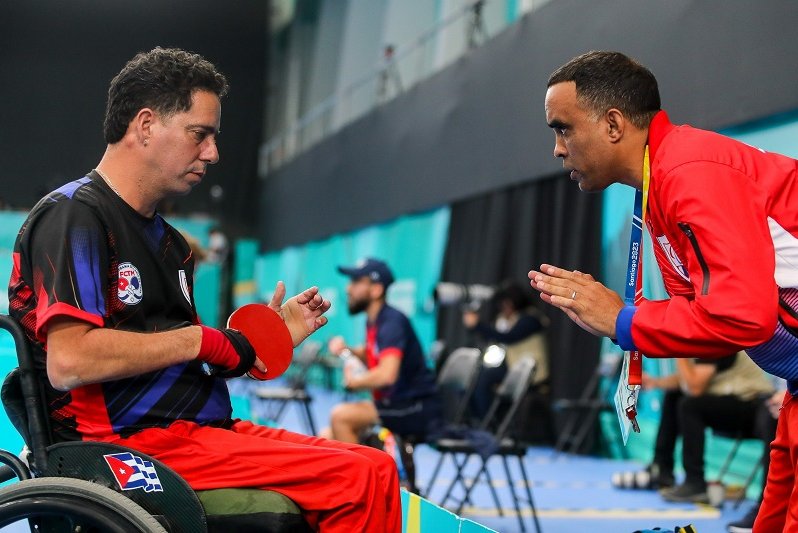 Yunier Fernández y su entrenador Rieldis Ortega