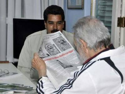 Conversan Fidel y Maduro