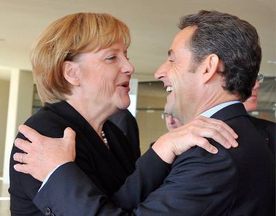 El exmandatario francés Nicolas Sarkozy y la canciller alemana, Angela Merkel