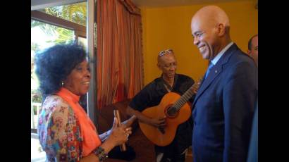 Michel Joseph Martelly y Eva Griñan