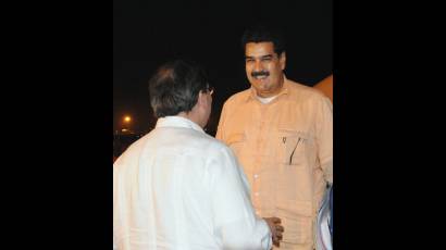 Bruno Rodríguez Parrilla y Nicolás Maduro