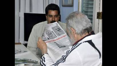 Conversan Fidel y Maduro