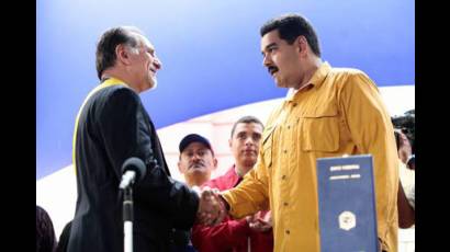 Presidente venezolano Nicolás Maduro con René González