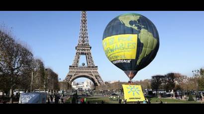 Greenpeace exigió a COP21 un acuerdo firme sobre energías renovables para 2050.