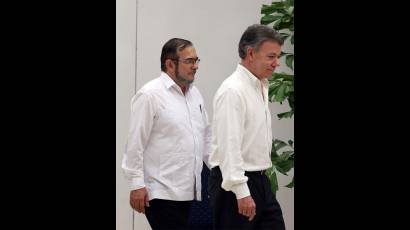 Timoleón Jiménez y Juan Manuel Santos