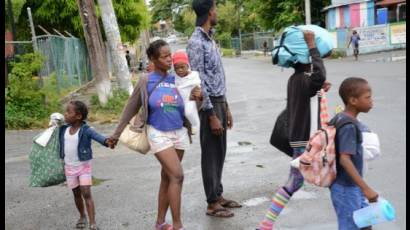 Haitianos evacuando