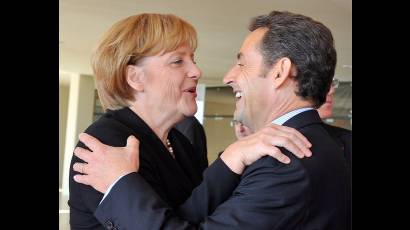 El exmandatario francés Nicolas Sarkozy y la canciller alemana, Angela Merkel