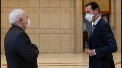 Mohamad Yavad Zarif se reúne con el presidente Al Assad