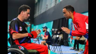 Yunier Fernández y su entrenador Rieldis Ortega