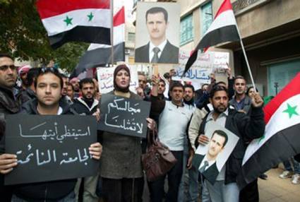 Sirios rechazan la suspensión de su país