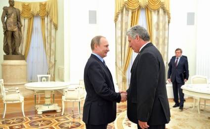 Vicepresidente cubano Miguel Díaz Canel y Vladimir Putin