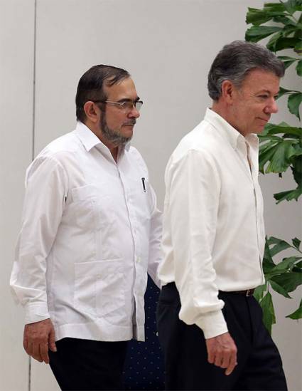 Timoleón Jiménez y Juan Manuel Santos