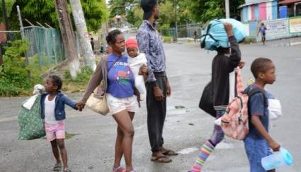 Haitianos evacuando