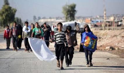 Niños huyen de Mosul para evitar convertirse en «cachorros» del EI