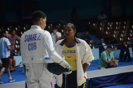 Yordano junto a su entrenadora Arisneidys Verdecia