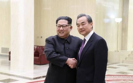 Kim Jong-un y Wang Yi