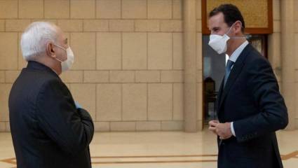 Mohamad Yavad Zarif se reúne con el presidente Al Assad
