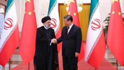 Xi Jinping y Ebrahim Raisi