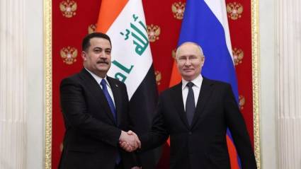 Presidente ruso Vladimir Putin y primer ministro iraquí, Mohammed Al-Sudani