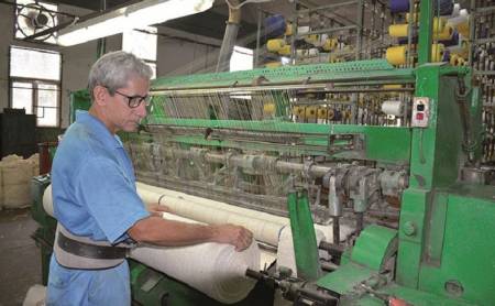 Obrero calificado en hilatura, tejeduría  y acabado textil